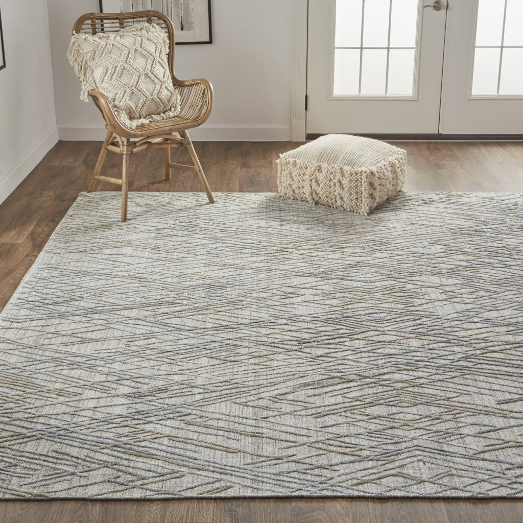 4' X 6' Gray And Ivory Abstract Hand Woven Area Rug