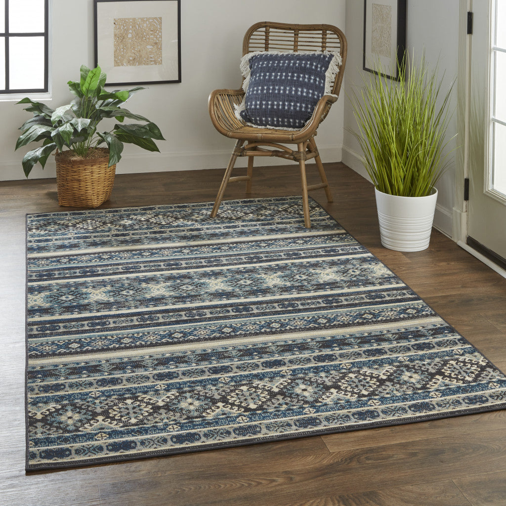 5' X 8' Blue Tan And Black Geometric Power Loom Distressed Stain Resistant Area Rug