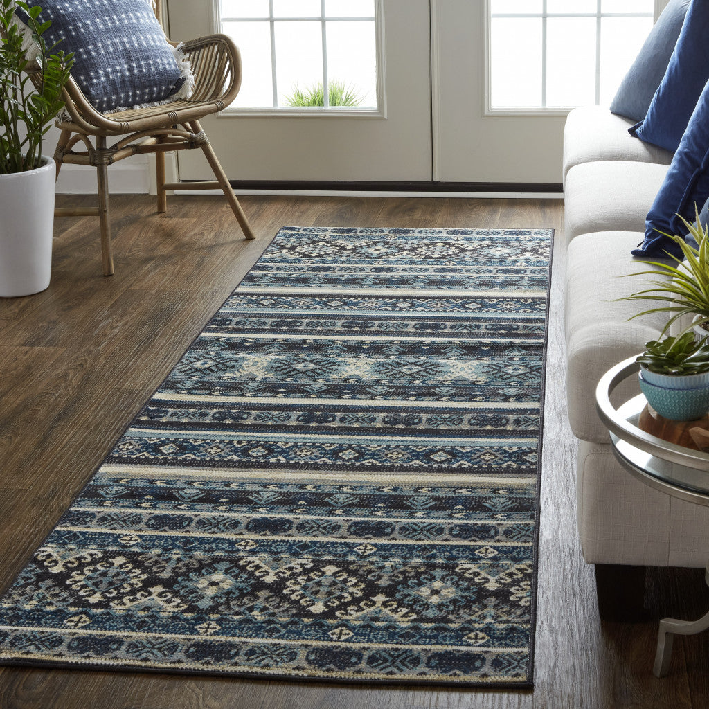 5' X 8' Blue Tan And Black Geometric Power Loom Distressed Stain Resistant Area Rug