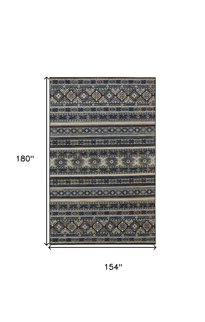 5' X 8' Blue Tan And Black Geometric Power Loom Distressed Stain Resistant Area Rug