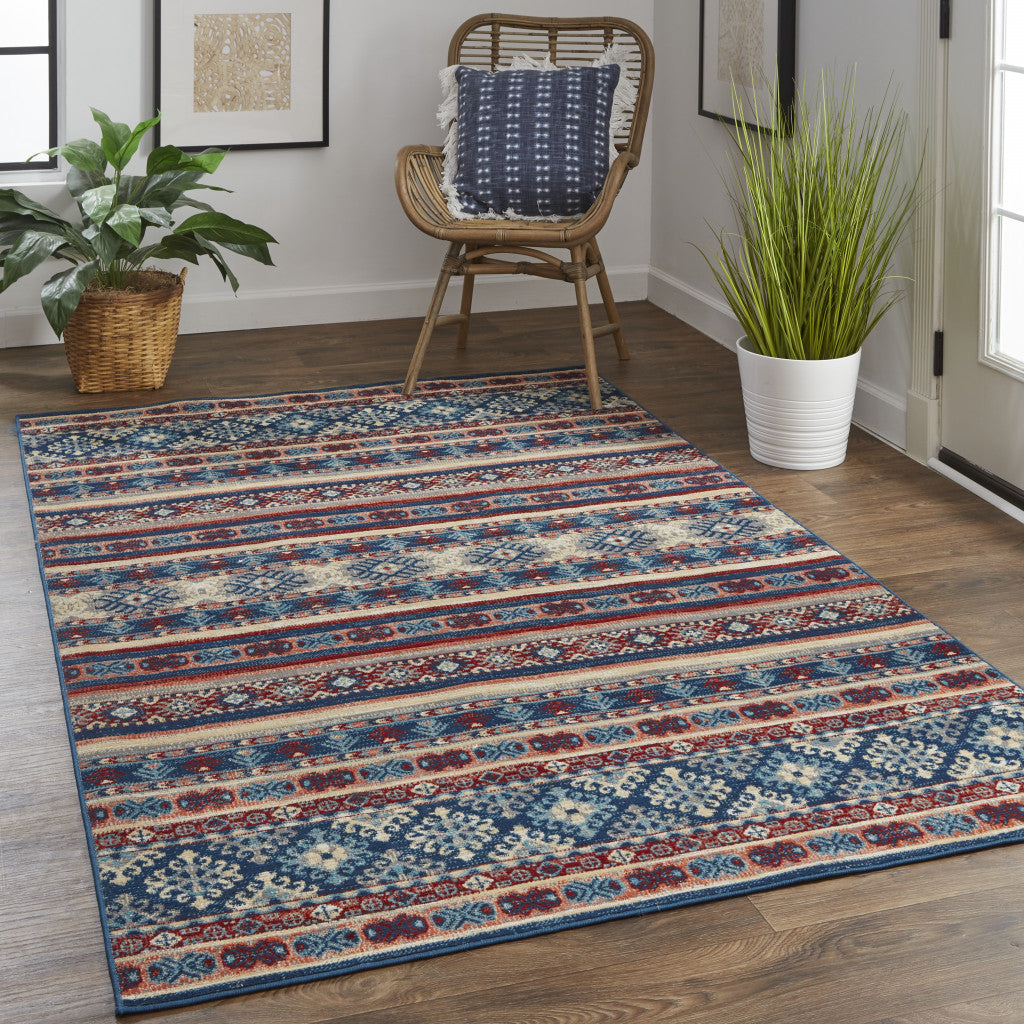 5' X 8' Blue Tan And Black Geometric Power Loom Distressed Stain Resistant Area Rug