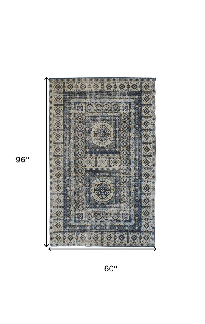 5' X 8' Ivory Tan And Blue Abstract Power Loom Distressed Stain Resistant Area Rug