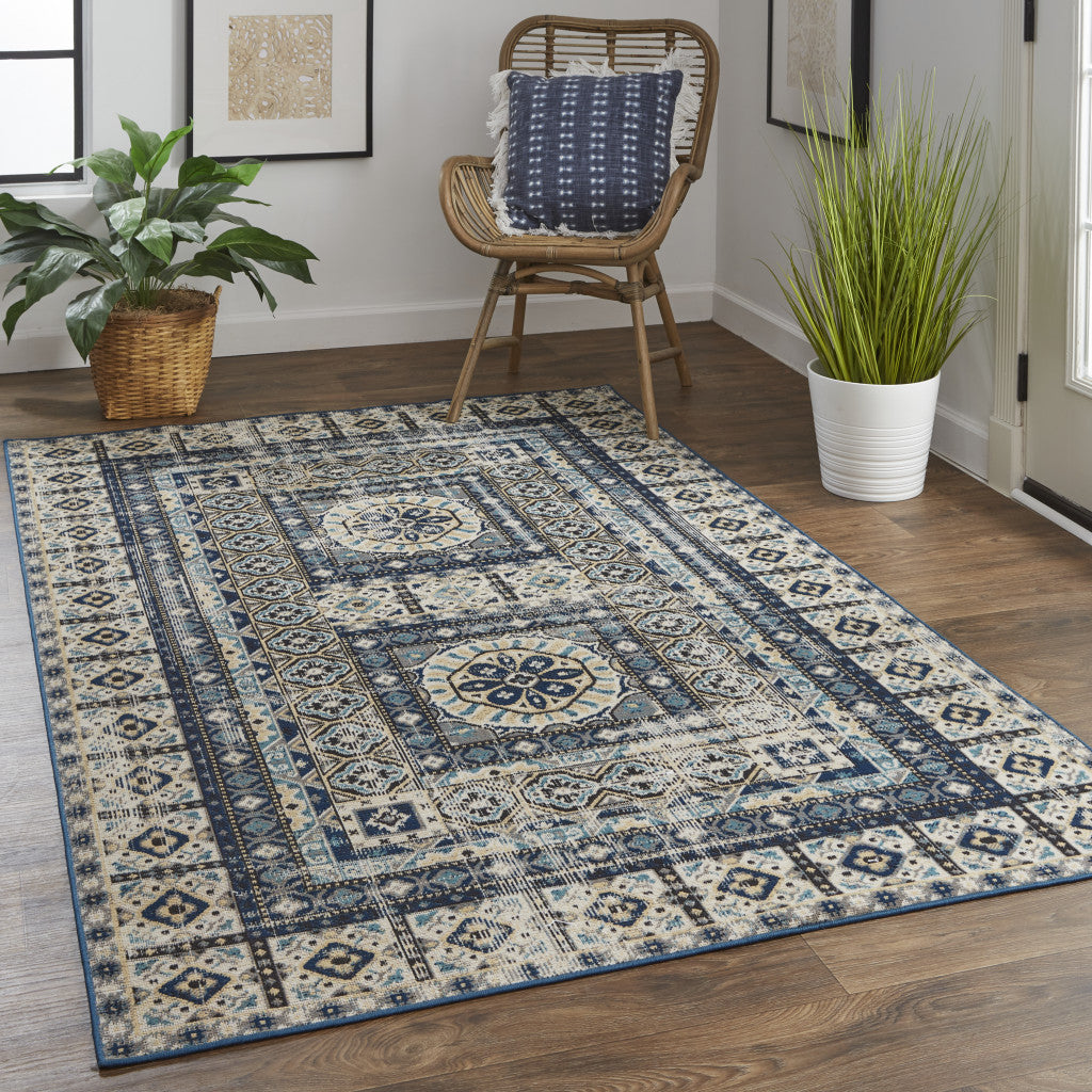 5' X 8' Ivory Tan And Blue Abstract Power Loom Distressed Stain Resistant Area Rug