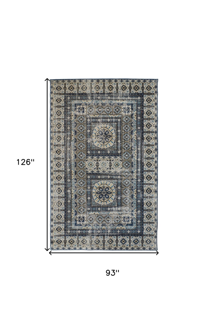 5' X 8' Ivory Tan And Blue Abstract Power Loom Distressed Stain Resistant Area Rug