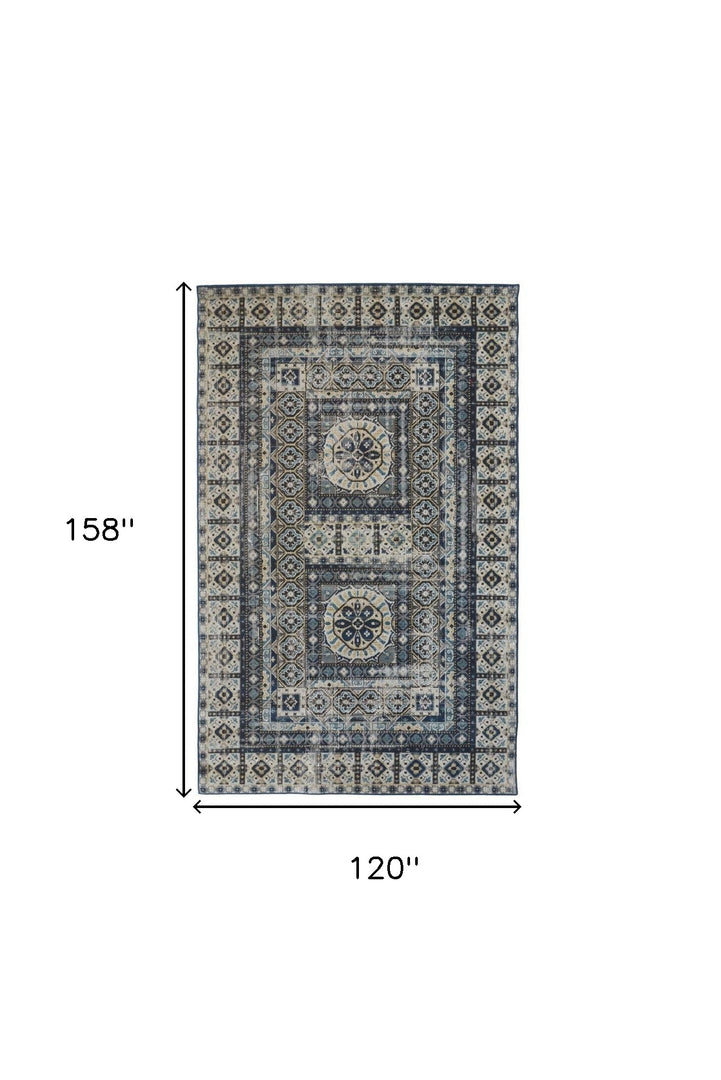 5' X 8' Ivory Tan And Blue Abstract Power Loom Distressed Stain Resistant Area Rug