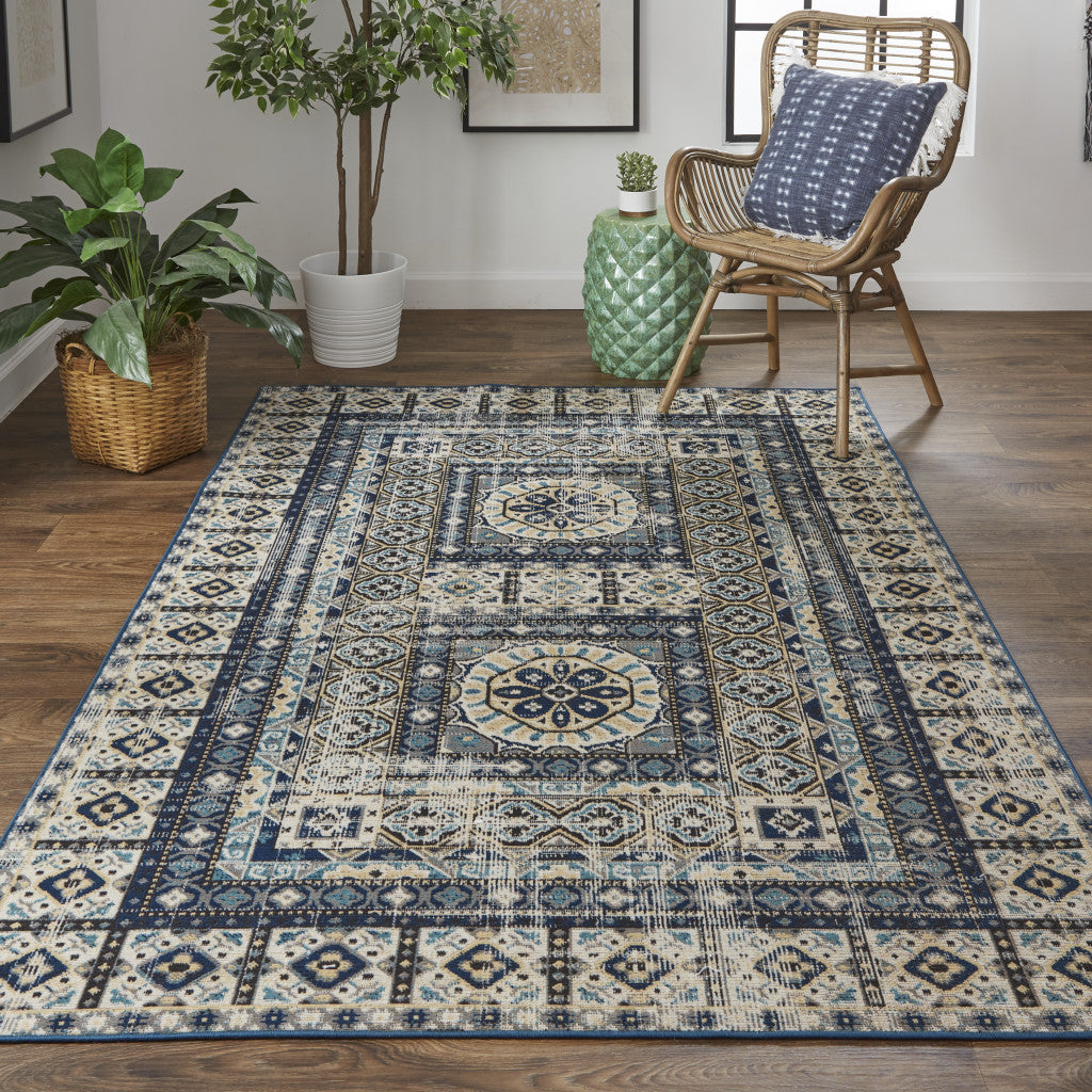 5' X 8' Ivory Tan And Blue Abstract Power Loom Distressed Stain Resistant Area Rug