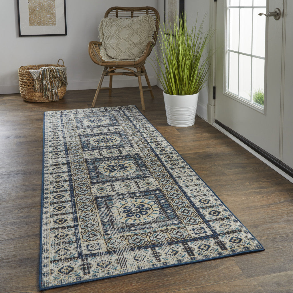 5' X 8' Ivory Tan And Blue Abstract Power Loom Distressed Stain Resistant Area Rug