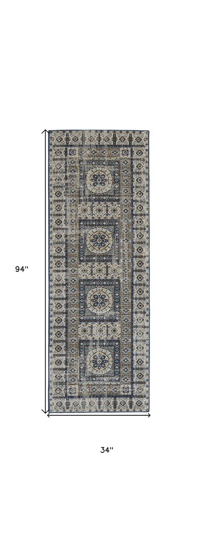 5' X 8' Ivory Tan And Blue Abstract Power Loom Distressed Stain Resistant Area Rug