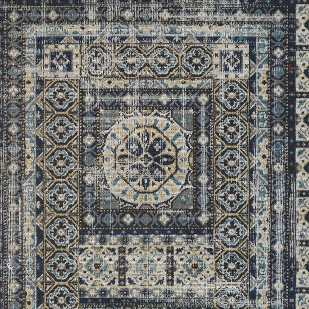 5' X 8' Ivory Tan And Blue Abstract Power Loom Distressed Stain Resistant Area Rug