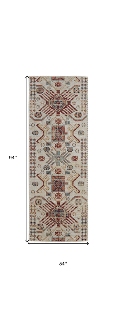 5' X 8' Ivory Red And Tan Abstract Power Loom Distressed Stain Resistant Area Rug