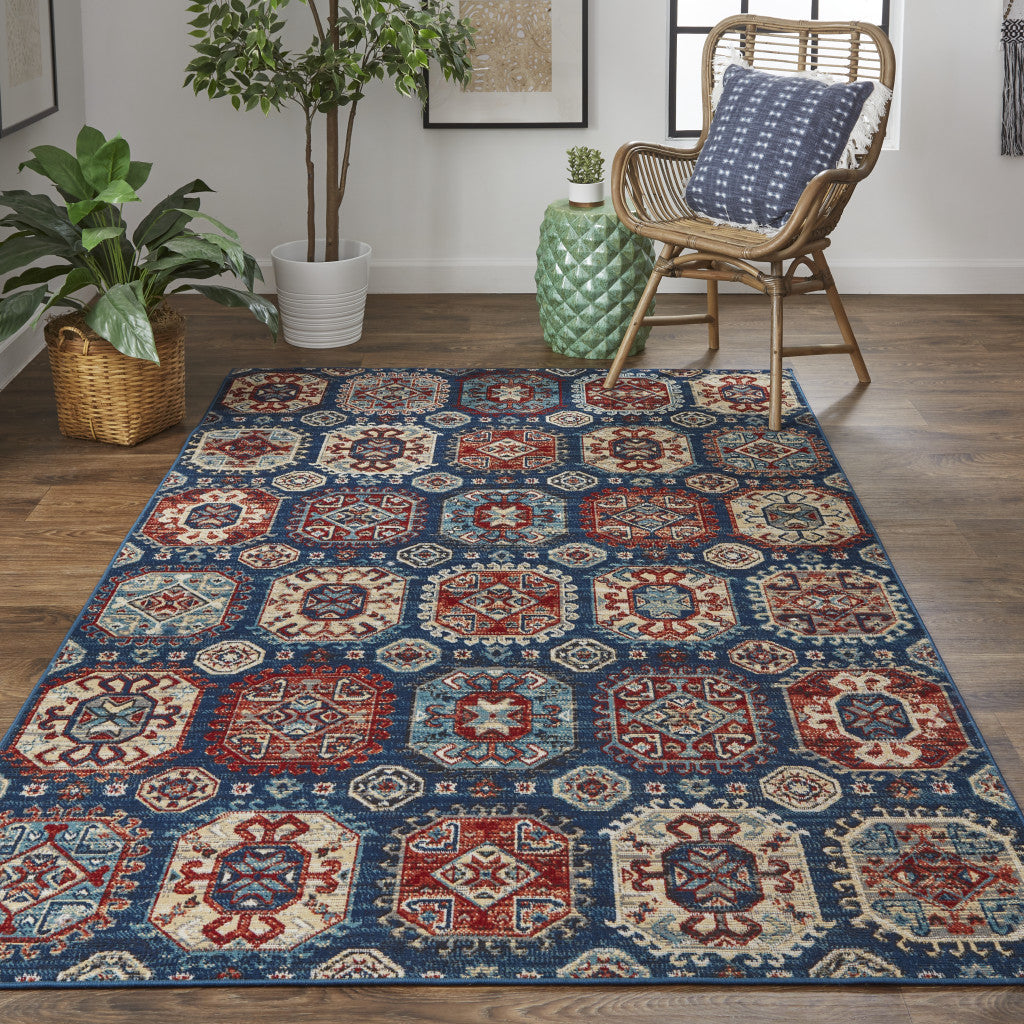 7' X 10' Blue Red And Tan Abstract Power Loom Distressed Stain Resistant Area Rug