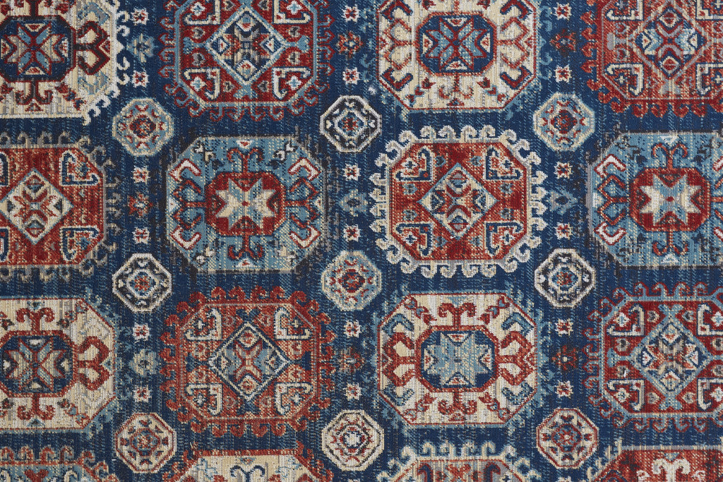 7' X 10' Blue Red And Tan Abstract Power Loom Distressed Stain Resistant Area Rug