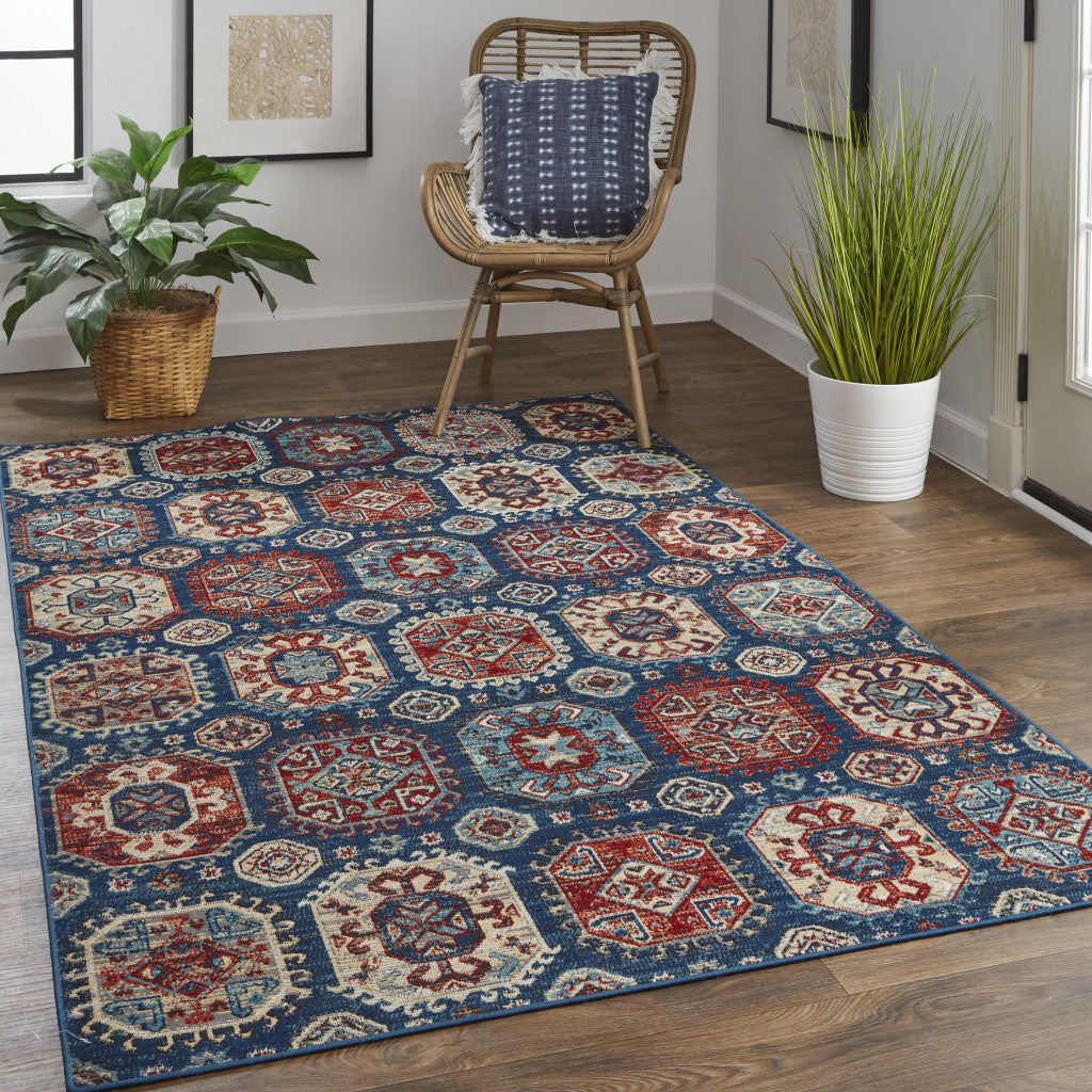 7' X 10' Blue Red And Tan Abstract Power Loom Distressed Stain Resistant Area Rug