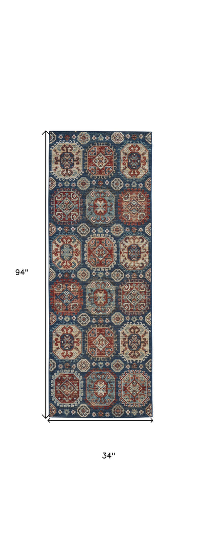 7' X 10' Blue Red And Tan Abstract Power Loom Distressed Stain Resistant Area Rug