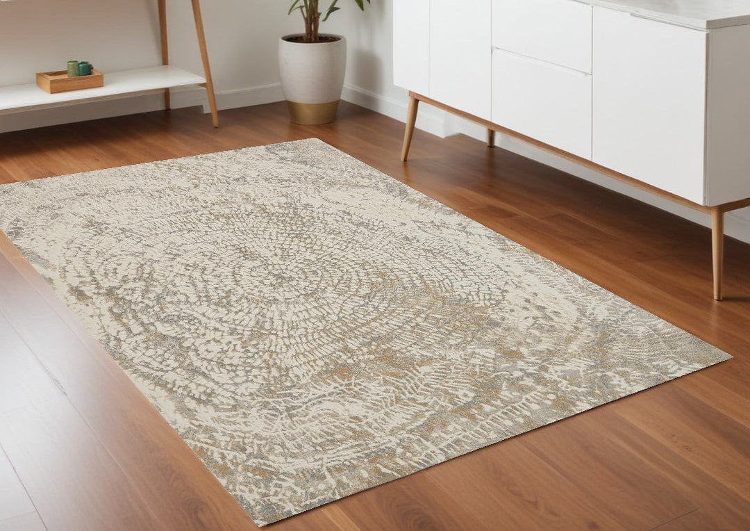 4' X 6' Ivory Tan And Gray Abstract Area Rug