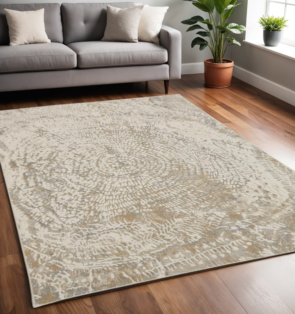 4' X 6' Ivory Tan And Gray Abstract Area Rug