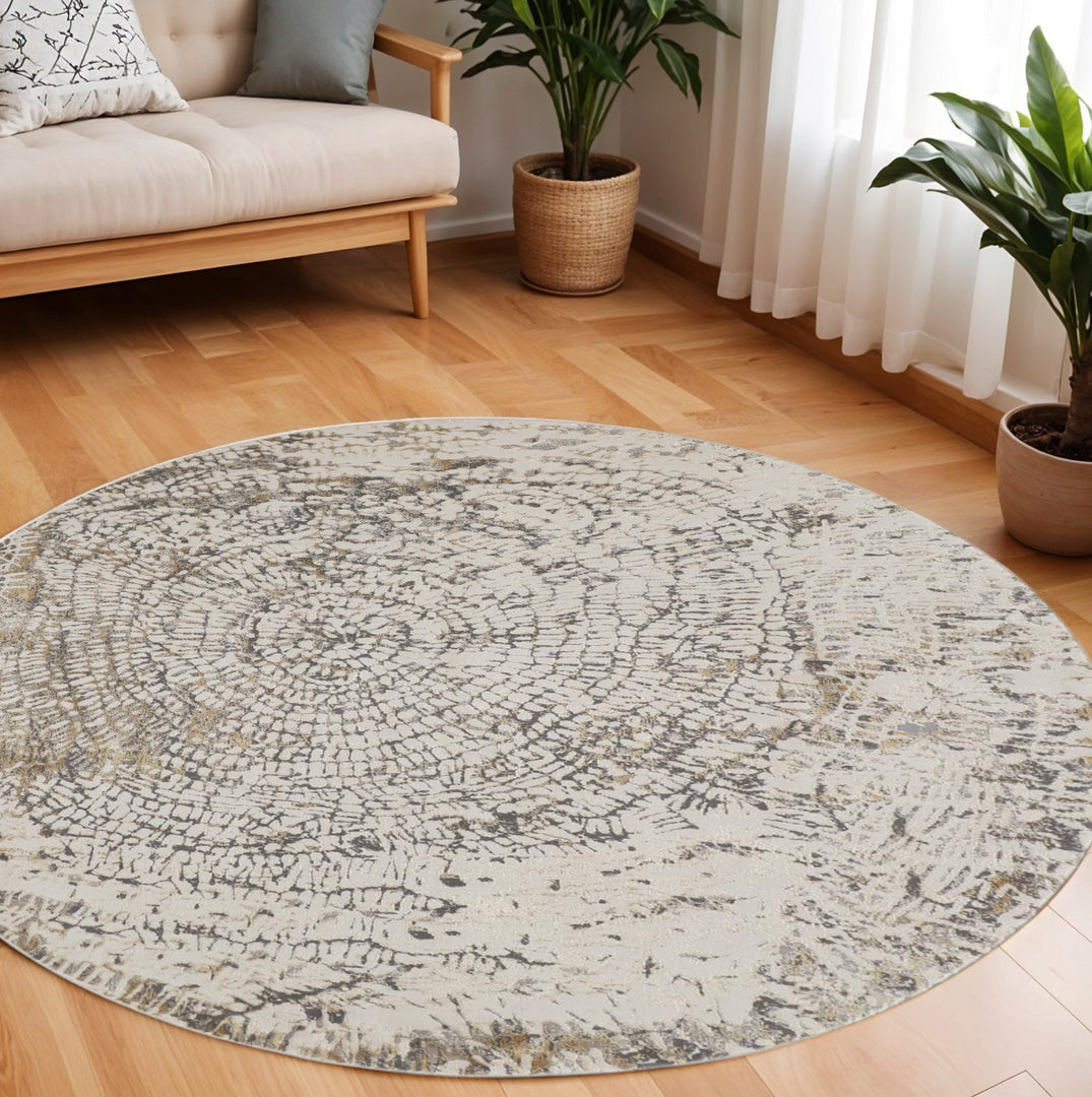 4' X 6' Ivory Tan And Gray Abstract Area Rug