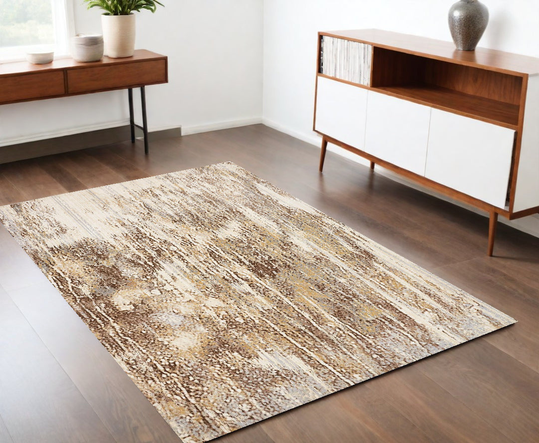 4' X 6' Tan Ivory And Brown Abstract Area Rug