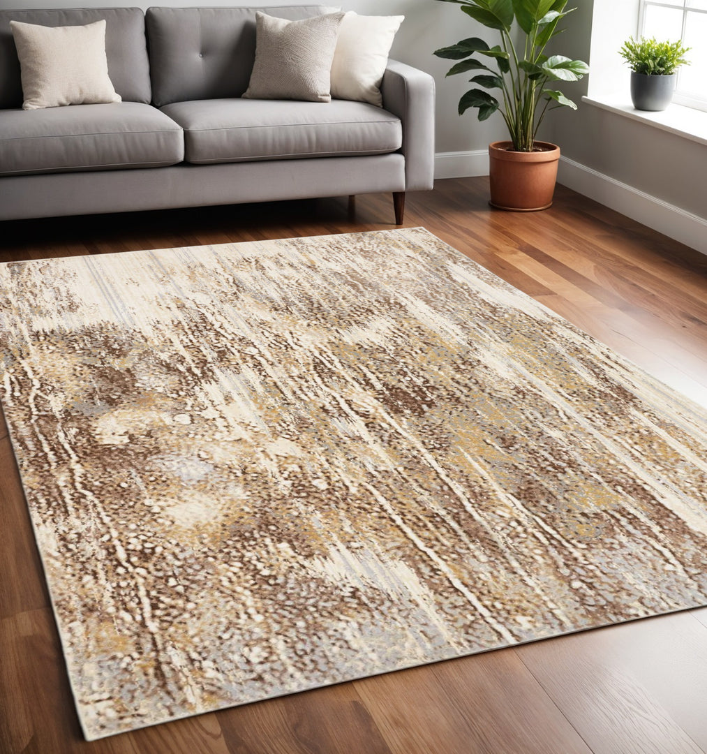 4' X 6' Tan Ivory And Brown Abstract Area Rug