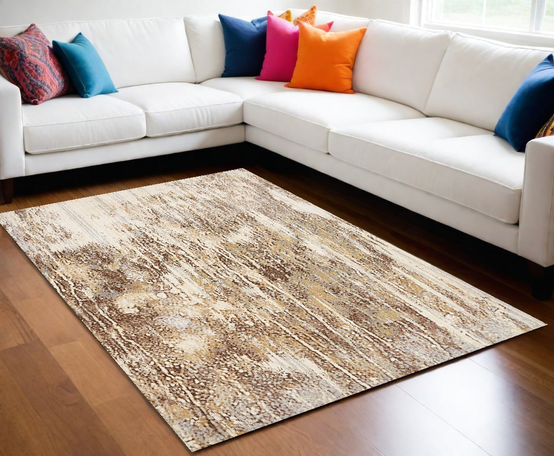 4' X 6' Tan Ivory And Brown Abstract Area Rug