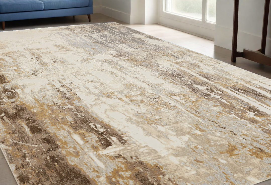 4' X 6' Tan Ivory And Gray Abstract Area Rug