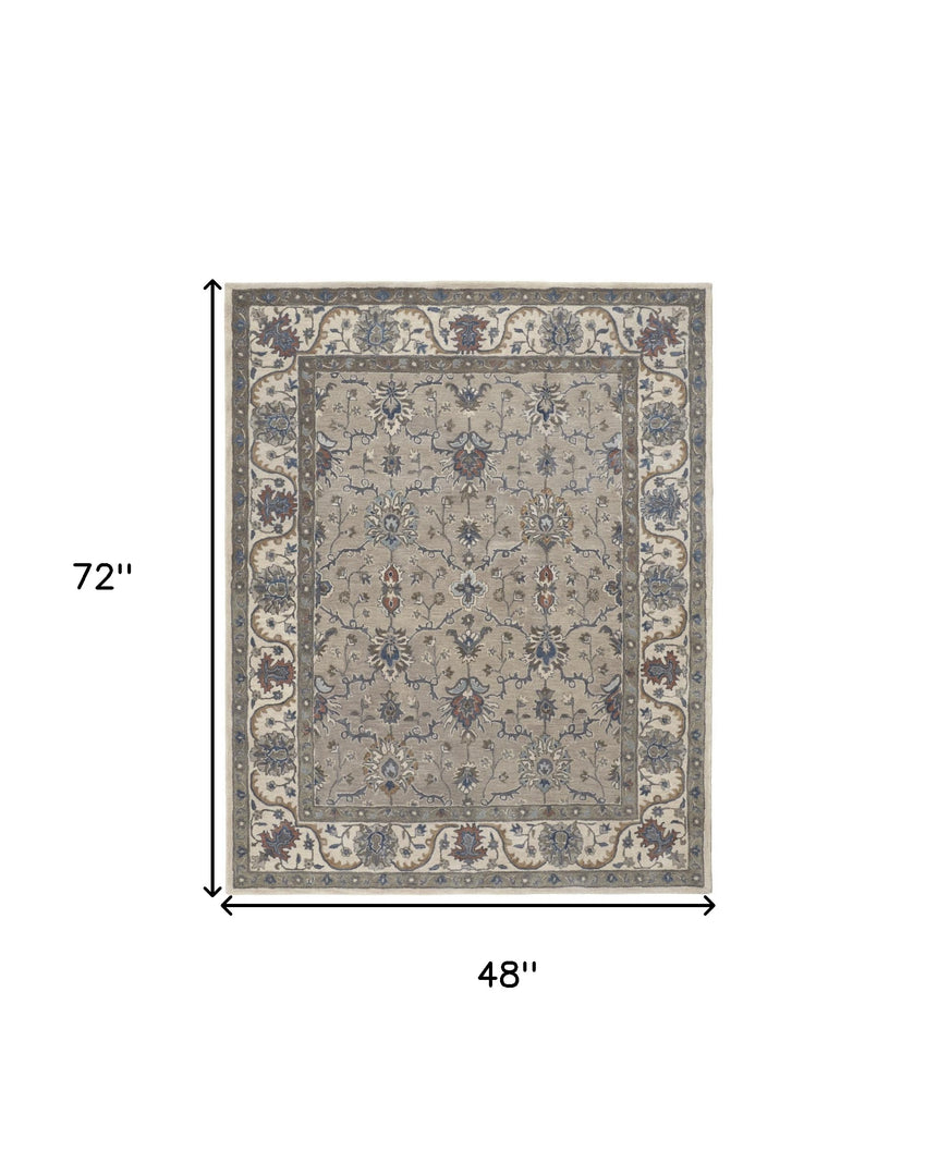 4' X 6' Ivory and Blue Wool Floral Hand Tufted Area Rug