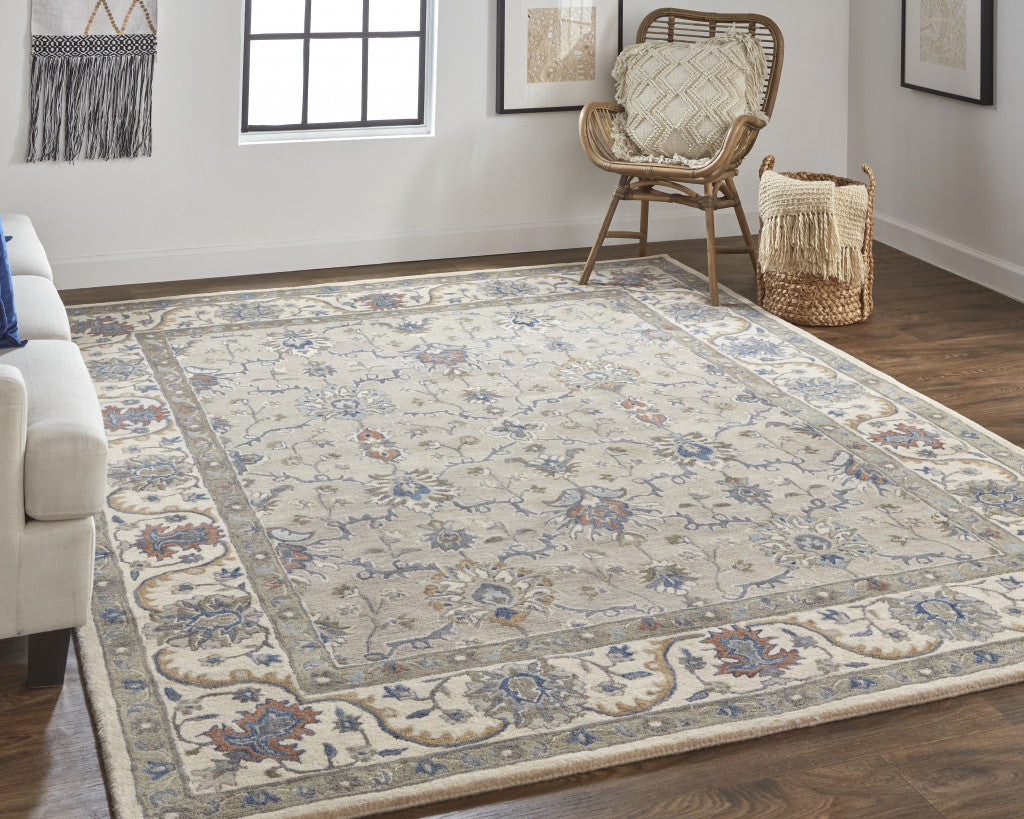 4' X 6' Ivory and Blue Wool Floral Hand Tufted Area Rug