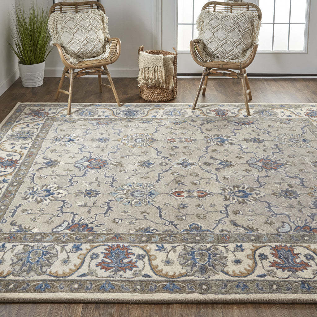 4' X 6' Ivory and Blue Wool Floral Hand Tufted Area Rug