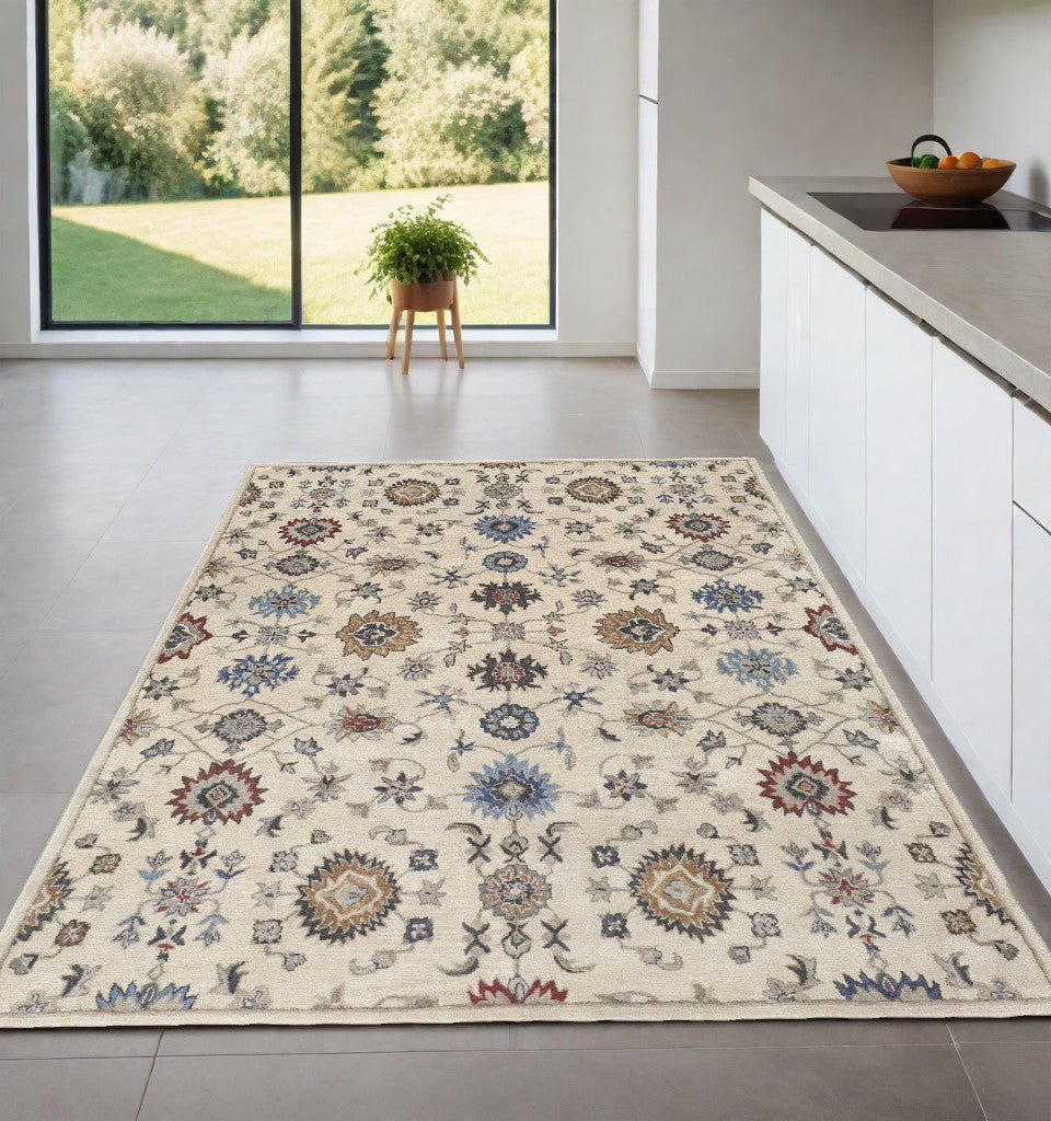 4' X 6' Ivory and Blue Wool Floral Hand Tufted Area Rug