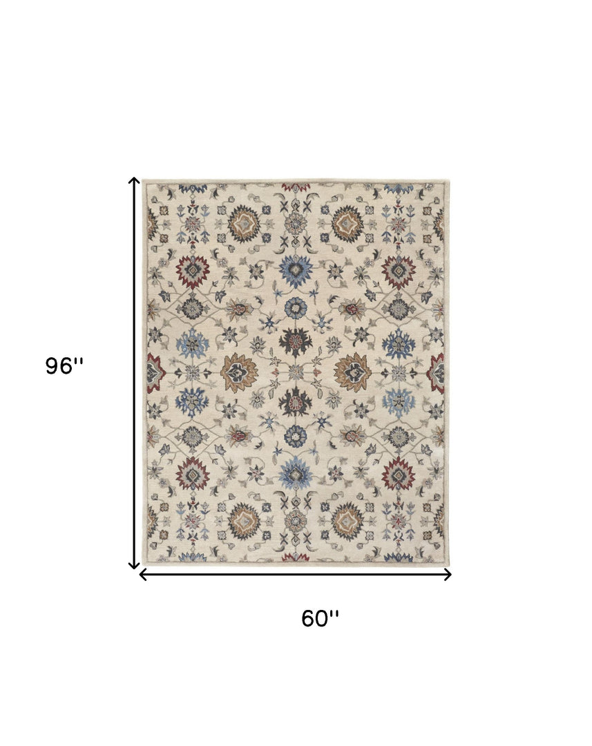 4' X 6' Ivory and Blue Wool Floral Hand Tufted Area Rug