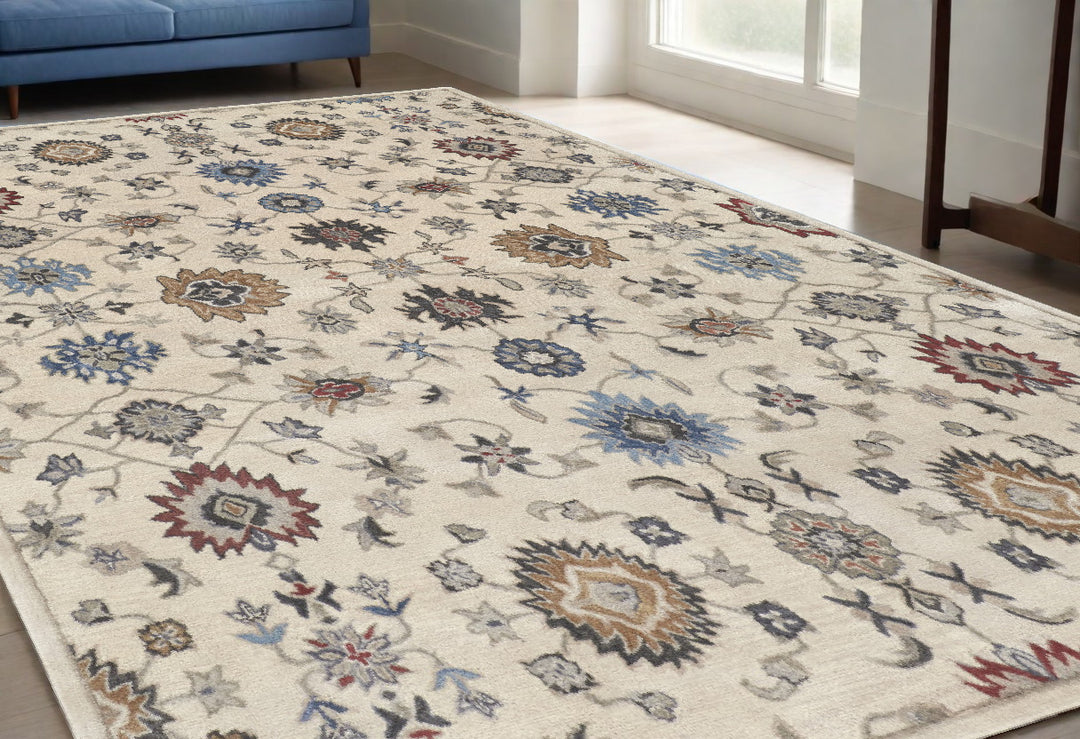 4' X 6' Ivory and Blue Wool Floral Hand Tufted Area Rug