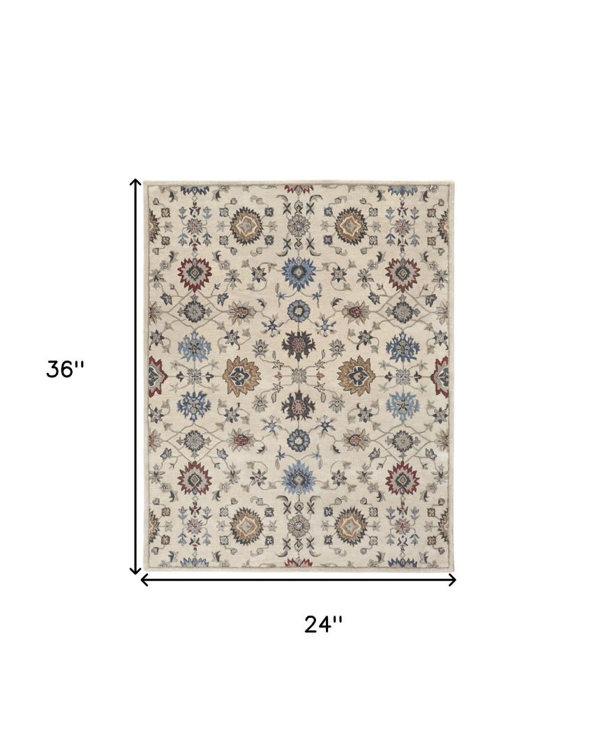 4' X 6' Ivory and Blue Wool Floral Hand Tufted Area Rug