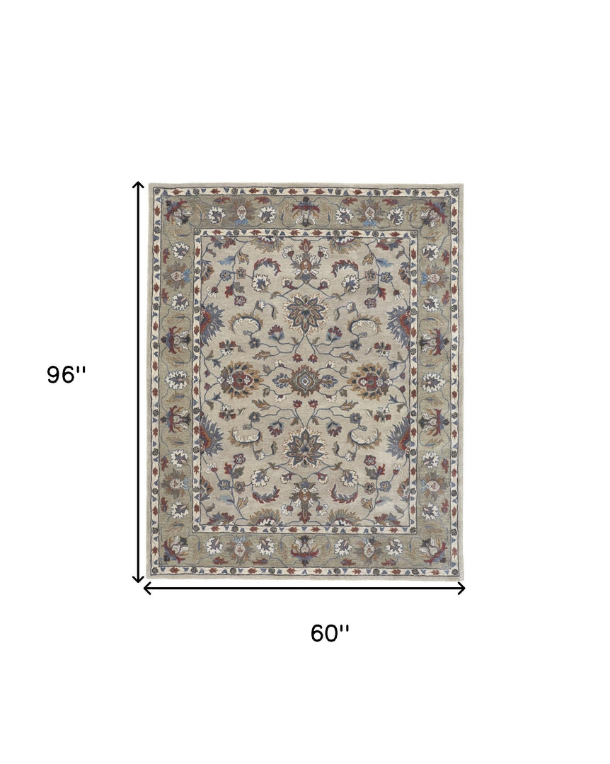 4' X 6' Ivory and Blue Wool Floral Hand Tufted Area Rug