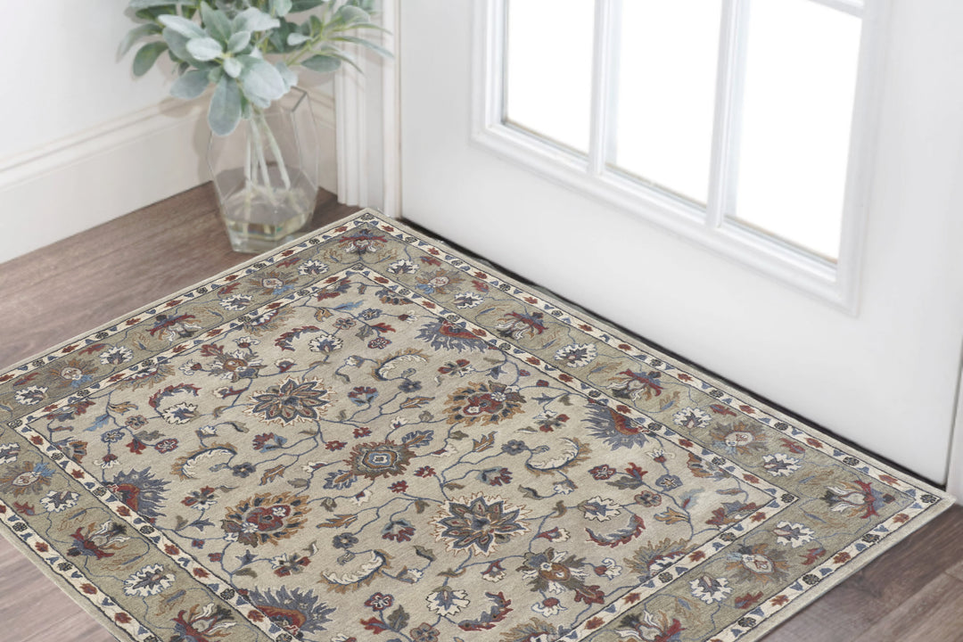 4' X 6' Ivory and Blue Wool Floral Hand Tufted Area Rug