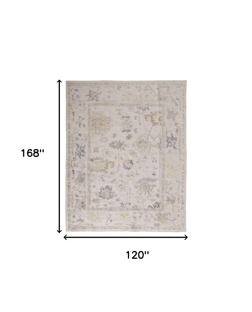 4' X 6' Tan Ivory And Orange Floral Hand Knotted Stain Resistant Area Rug