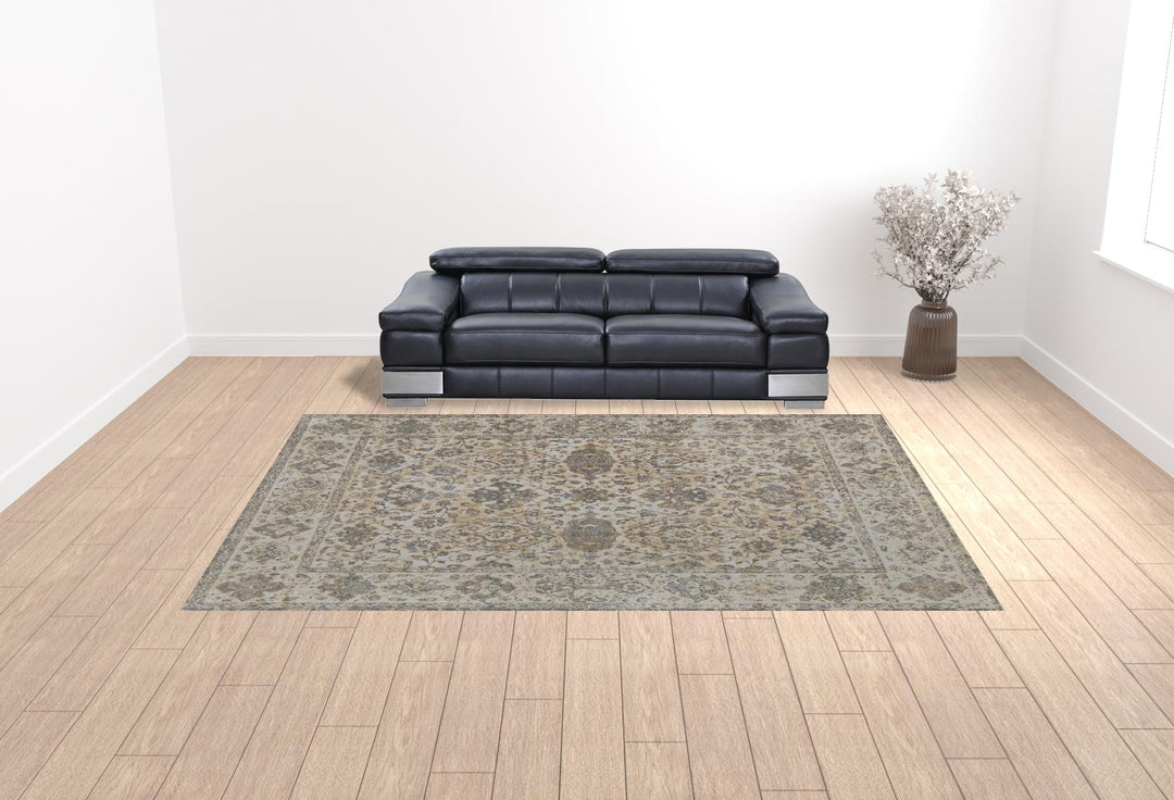 9' X 12' Ivory Tan And Gray Power Loom Area Rug