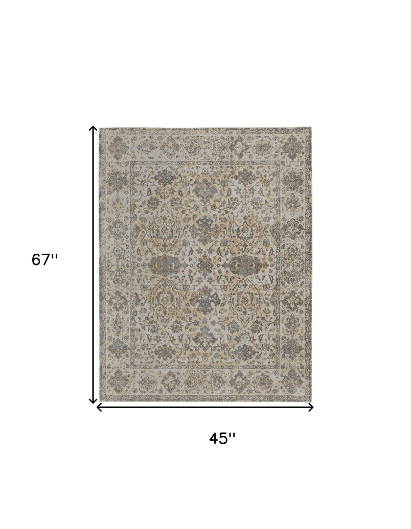 9' X 12' Ivory Tan And Gray Power Loom Area Rug