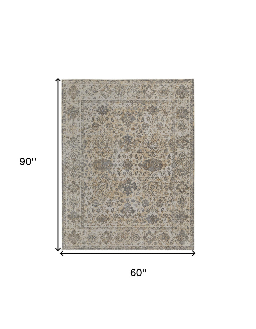 9' X 12' Ivory Tan And Gray Power Loom Area Rug