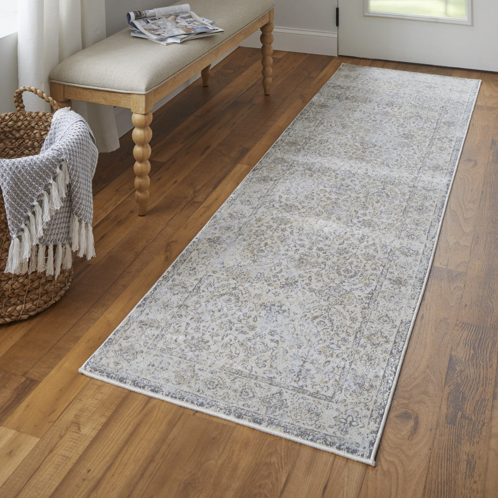 9' X 12' Ivory Tan And Gray Power Loom Area Rug