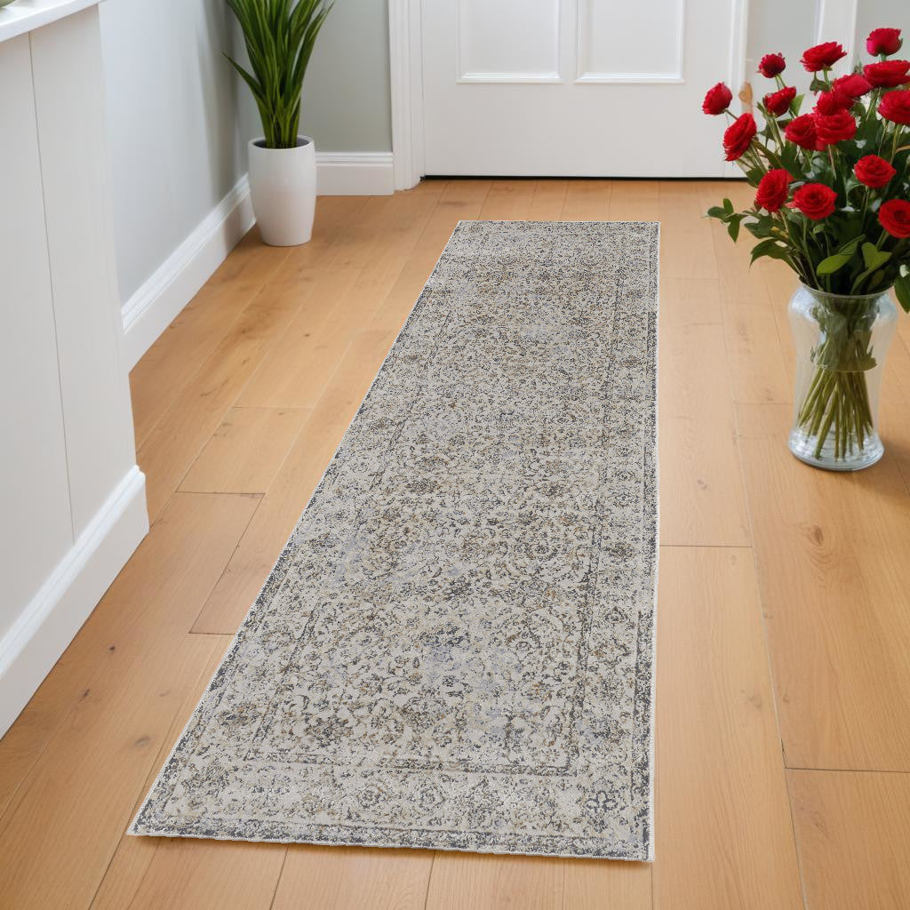 9' X 12' Ivory Tan And Gray Power Loom Area Rug