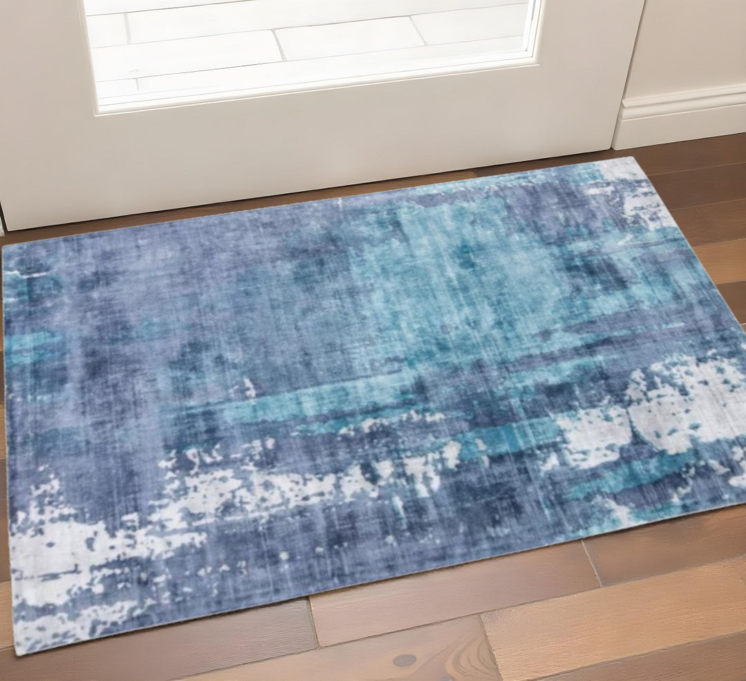 2' X 3' Blue And Ivory Abstract Hand Woven Area Rug