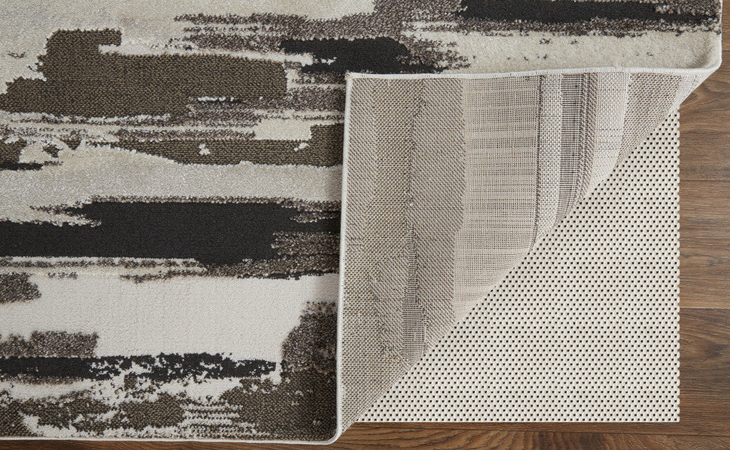 2' X 3' Brown and Ivory Abstract Power Loom Distressed Area Rug