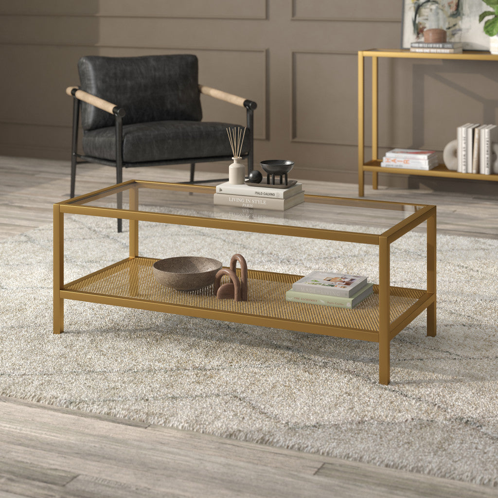 45" Clear and Gold Glass and Steel Coffee Table with Shelf