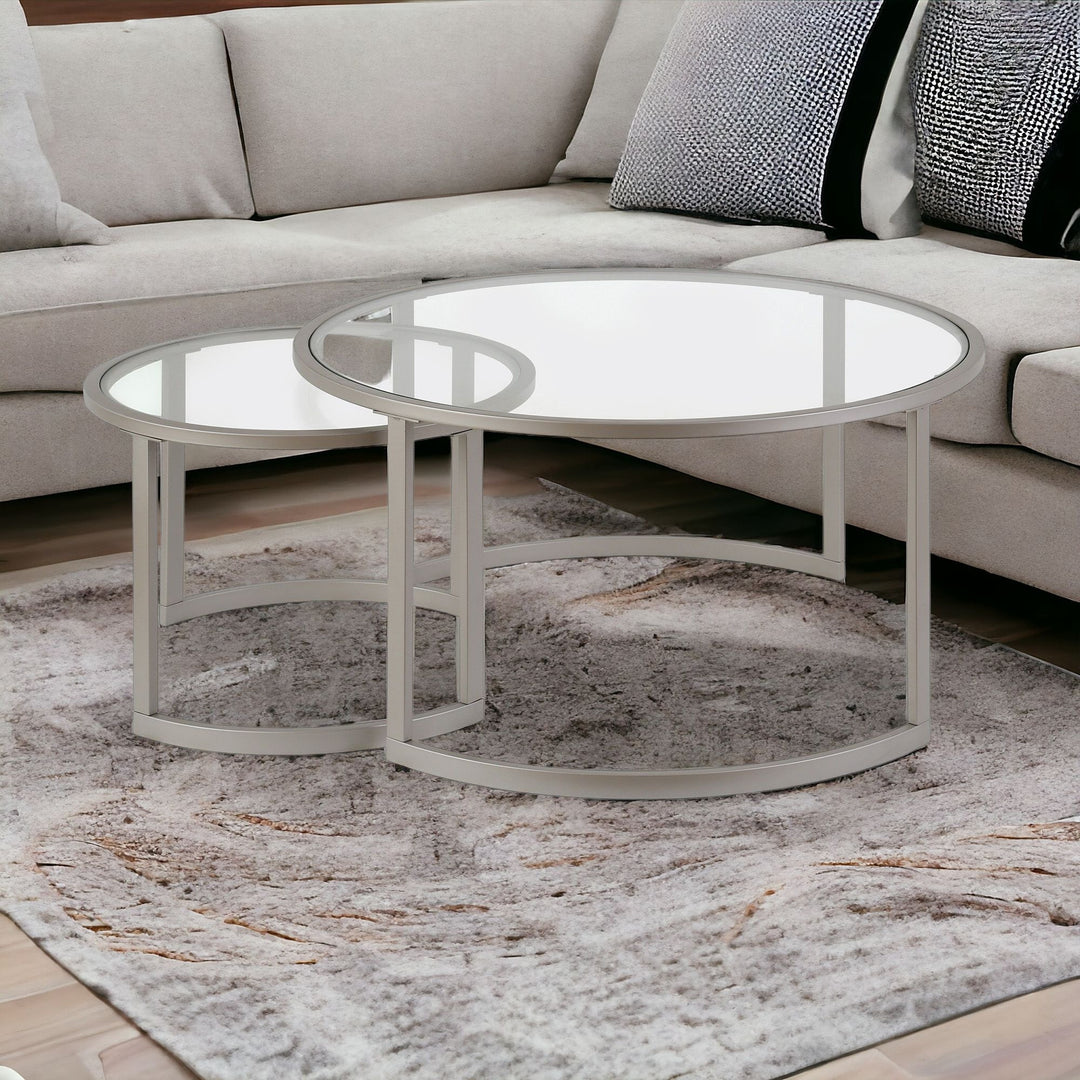 Set of Two 36-Inch Nickel Glass and Steel Round Nested Coffee Tables