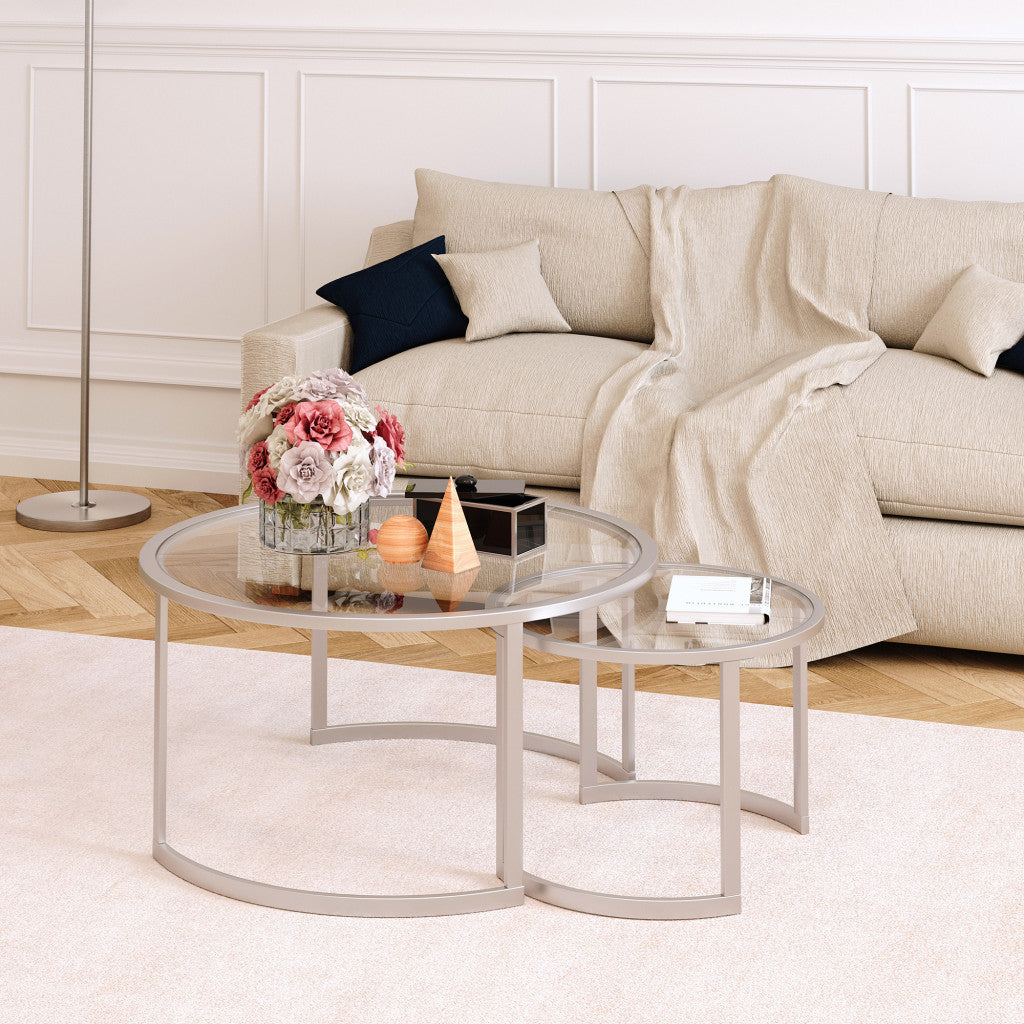 Set of Two 36-Inch Nickel Glass and Steel Round Nested Coffee Tables