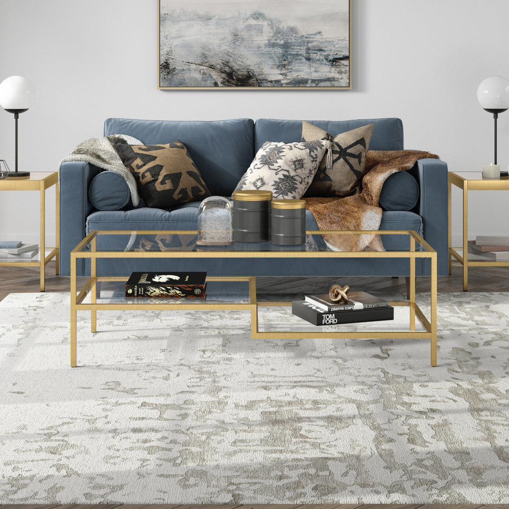 54-Inch Gold Glass And Steel Coffee Table with Two Shelves