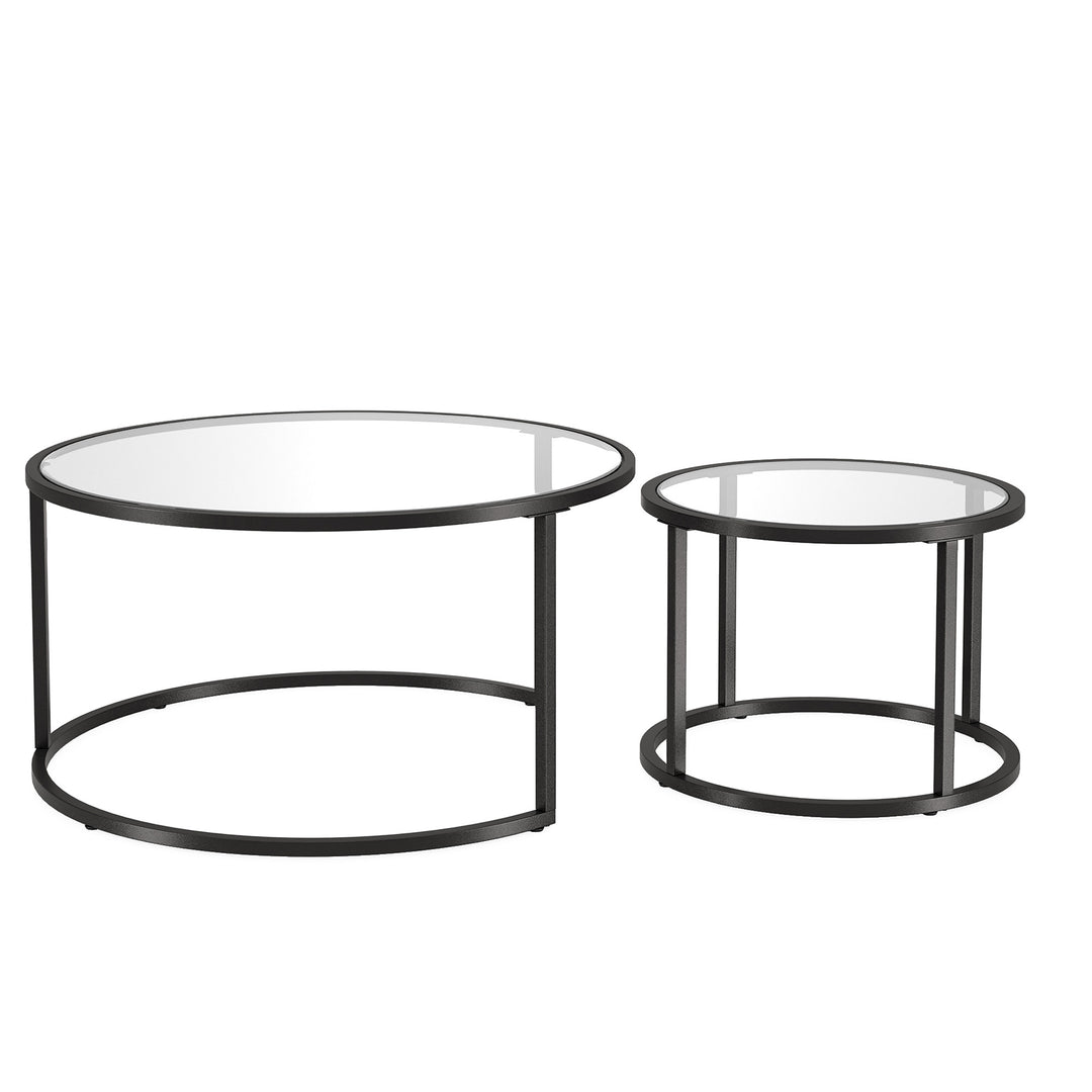 Set of Two 35-Inch Black Glass and Steel Round Nested Coffee Tables