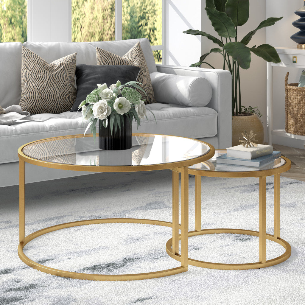 Set of Two 35" Gold Glass And Steel Round Nested Coffee Tables