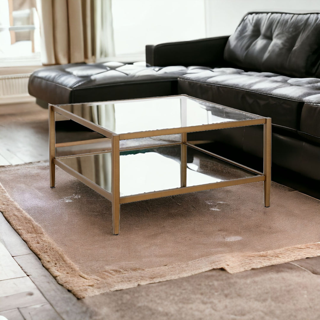 Luxurious 32" Gold Glass And Steel Square Coffee Table With Shelf