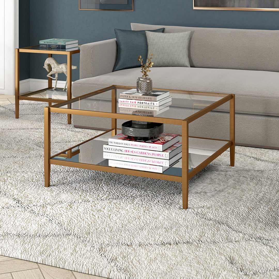 Luxurious 32" Gold Glass And Steel Square Coffee Table With Shelf